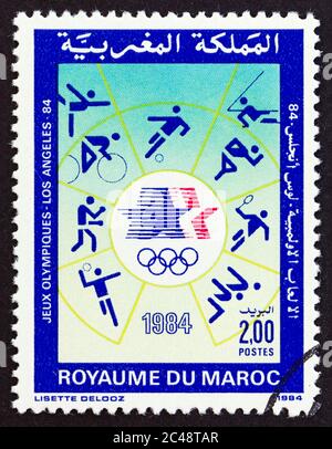 MAROCCO - CIRCA 1984: Un francobollo stampato in Marocco dal '1984 Olimpiadi estive' edizione mostra sport, circa 1984. Foto Stock