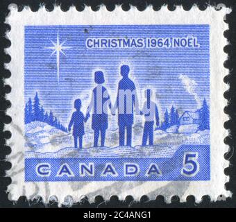 CANADA - CIRCA 1964: Francobollo stampato dal Canada, spettacoli Famiglia e Stella di Betlemme, circa 1964 Foto Stock