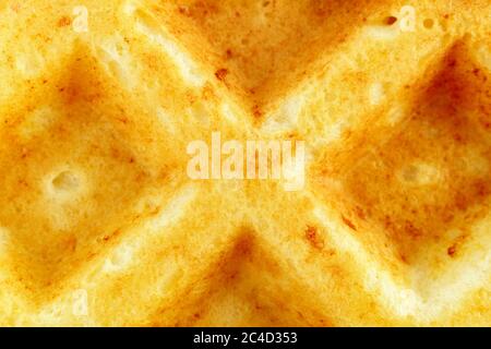 la superficie è di cialde, torte fatte in casa. Cibo sfondo. Waffle sfondo. Consistenza, fuoco selettivo Foto Stock