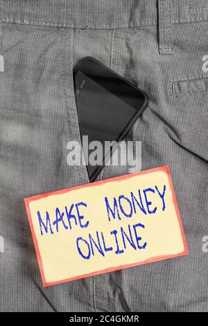 Scrittura di testo a mano Make Money Online. Foto concettuale ottenere pagato guadagnare denaro attraverso freelancing e web marketing smartphone dispositivo all'interno formale Foto Stock