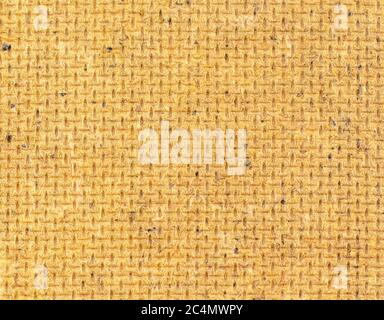 Vecchio tessuto giallo con macchie e graffi Foto Stock