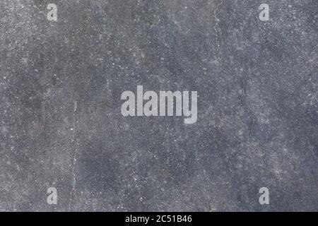 Grigio scuro astratto intemperie fondo liscio in cemento. Elegante struttura architettonica. Foto Stock