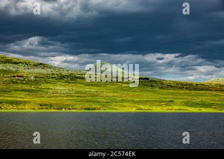 Nuvole sulla cima del monte Muen nel Parco Nazionale di Rondane, Norvegia Foto Stock