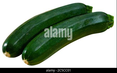 Immagine di zucchine verdi grezze. Isolato su sfondo bianco Foto Stock