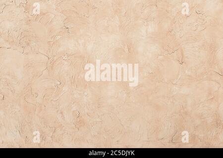 Fondo decorativo in gesso beige a basso contrasto Foto Stock