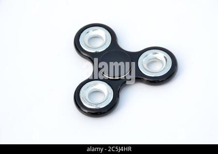 lo spinner nero in argento isolato su sfondo bianco. Foto Stock