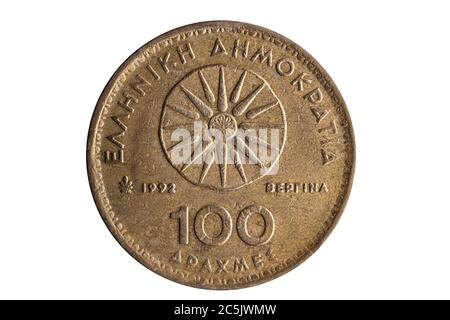 Moneta greca da 100 dracme del 1992 che mostra Star of Vergina il simbolo della dinastia Argead tagliato e isolato su sfondo bianco Foto Stock