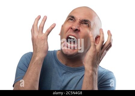 Immagine di un giovane calvo arrabbiato urlando l'uomo Foto Stock