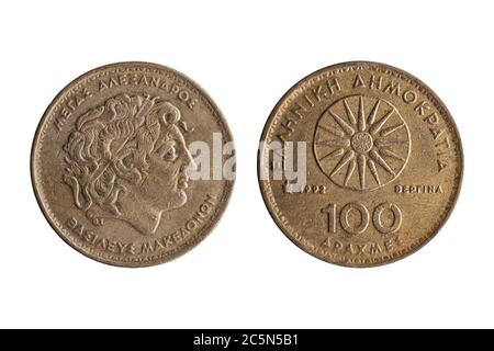 Moneta greca da 100 dracme del 1992 con un ritratto di Alessandro il Grande e Stella di Vergina tagliato e isolato su una ba bianca Foto Stock