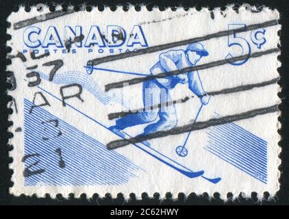 CANADA - CIRCA 1956: Francobollo stampato dal Canada, sciatore spettacoli, circa 1956 Foto Stock