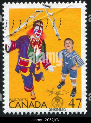 CANADA - CIRCA 2001: Francobollo stampato dal Canada, mostra ragazzo e clown, circa 2001 Foto Stock