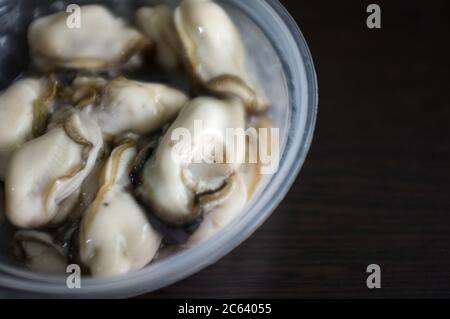 Primo piano Oyster fresco in Cup, pesce TAILANDESE Foto Stock