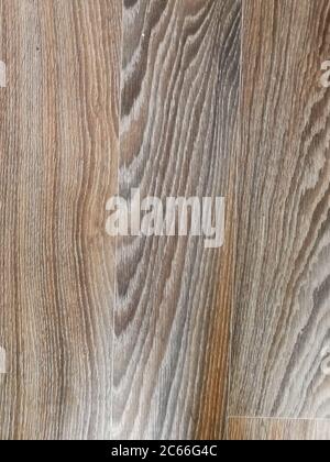 Struttura in legno con motivi in legno naturale per design e decorazione. Sfondo di legno marrone scuro. Sfondo naturale in legno di teak Foto Stock