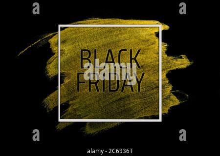 black friday. Scritta nera su oro con cornice bianca. Foto Stock