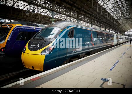 FirstGroup Trenitalia Avanti West Coast rail franchise WCML West Coast linea principale Alstom Classe 390 treno Pendolino da Londra a Manchester presso MCR Pic Foto Stock