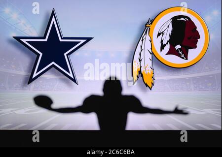 Dallas Cowboys vs. Washington Redskins. Gioco NFL. Partita della American Football League. Silhouette di giocatore professionista festeggia il tocco in giù. Schermata in ba Foto Stock