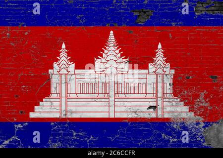 Bandiera Cambogia su grunge superficie graffiata in cemento. Storia nazionale d'annata. Concetto di parete retrò. Foto Stock