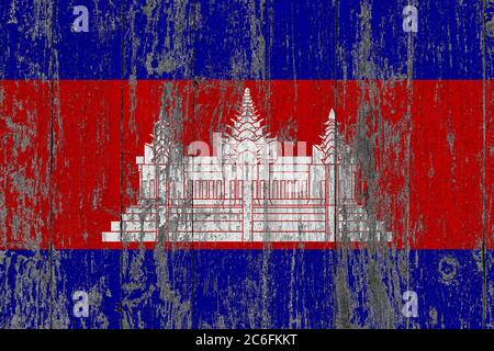 Bandiera Cambogia su grunge graffiato superficie di legno. Storia nazionale d'annata. Vecchia superficie dell'indicatore graffiata del tavolo in legno. Foto Stock