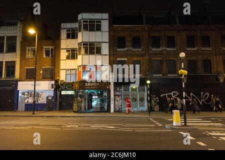 Ora demoliti i fronti dello shopping vittoriano su Norton Folgate, Shoreditch High Street, Londra, Regno Unito Foto Stock