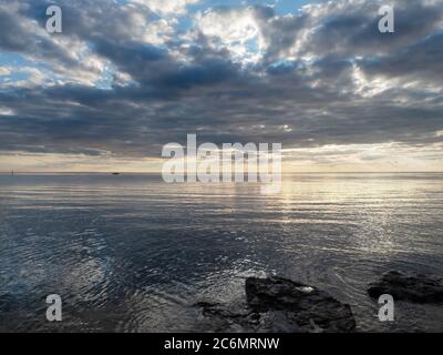 Il sole tramonta su Port Phillip Bay Foto Stock