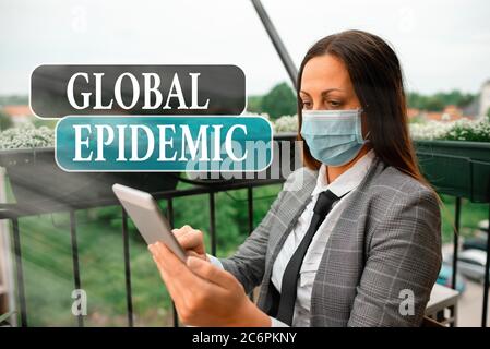 Scrittura concettuale a mano che mostra epidemia globale. Concetto che significa una rapida diffusione di una malattia comunicabile in un'ampia area geografica che promuove la salute Foto Stock