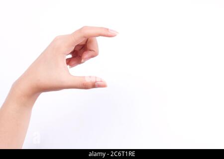 simboli delle mani del dito concetto isolato donna mano tenendo un biglietto da visita futuristico o fotocamera o telefono cellulare su sfondo bianco Foto Stock