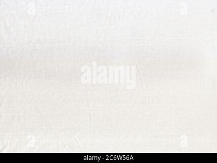 Un tessuto di cotone bianco sfondo. Un tessuto per creare t-shirt o abiti comodi. Foto Stock