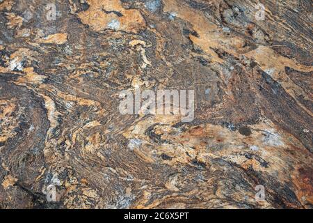 Texture di Migmatite su una roccia di terra nell'isola di Harakka dell'arcipelago di Helsinki, Finlandia Foto Stock