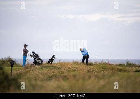 Turnberry, Scozia, Regno Unito. 13 luglio 2020. Nella foto: Sono stati fatti nuovi inviti a indagare sui rapporti commerciali di Trump dopo che il resort Trump Turnberry sta cercando di espandere il resort e di costruire un nuovo sviluppo sulla terra circostante a ovest del complesso alberghiero. Credit: Colin Fisher/Alamy Live News Foto Stock