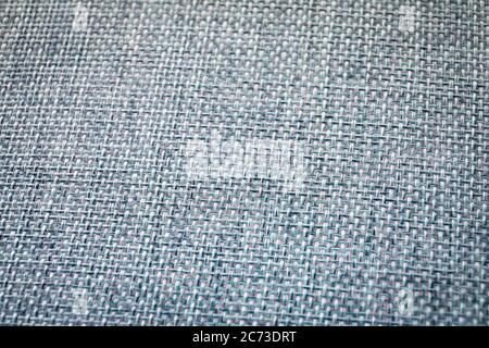 Tessuto grigio con trama ruvida per lo sfondo. Foto Stock