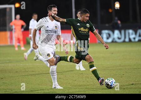 Orlando, Florida, Stati Uniti. 13 luglio 2020. Loria, centrocampista dei Timbers di Portland, Marvin n° 44, si mette in calcio durante il torneo MLS is Back all'ESPN Wild World of Sports di Orlando, Florida USA, lunedì 14 luglio 2020. Photo Credit: Marty Jean-Louis Credit: Marty Jean-Louis/Alamy Live News Foto Stock