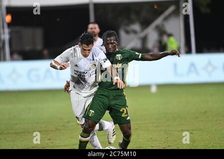 Orlando, Florida, Stati Uniti. 13 luglio 2020. Portland Timbers Chara, Diego n° 21 lotta per tenere la palla durante il torneo MLS is Back all'ESPN Wild World of Sports di Orlando Florida USA lunedì 14 luglio 2020. Photo Credit: Marty Jean-Louis Credit: Marty Jean-Louis/Alamy Live News Foto Stock