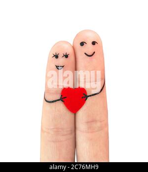 Coppia felice in amore con il dipinto di smiley holding cuore rosso Foto Stock