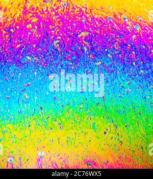 Colofo arcobaleno psichedelico modello astratto sulla superficie della bolla di sapone. Macro shot per la progettazione Foto Stock