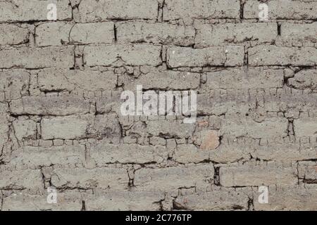 sfondo di adobe, mattoni di fango, parete vecchia marrone Foto Stock