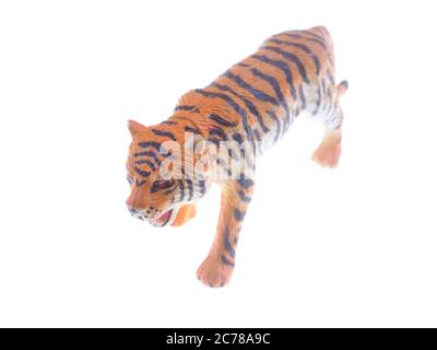 Toy tiger su sfondo bianco Foto Stock
