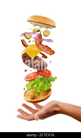 Strati volanti di hamburger. Concetto di cibo americano Foto Stock