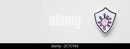 Scudo disegnato per proteggere contro il coronavirus Foto Stock