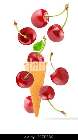 coni gelato con ingredienti che cadono in movimento Foto Stock