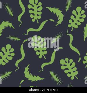 foglie verdi di piante su sfondo scuro Foto Stock