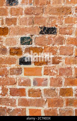 Vecchio muro con mattoni, facciata casa, sfondo Foto Stock
