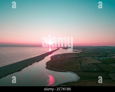 Tramonto sulla flotta di Weymouth, Dorset, Regno Unito Foto Stock