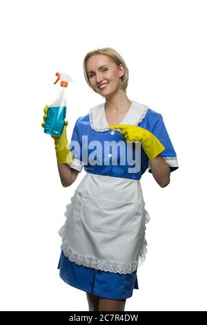 Felice sorridente donna governante in uniforme. Foto Stock