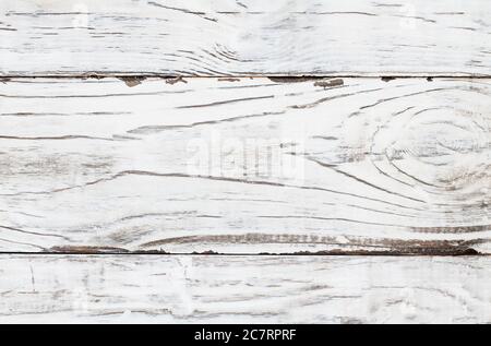 Sfondo bianco luminoso con texture in legno. Tavolo rustico in legno girato dall'alto. Foto Stock