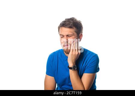 Ritratto di un uomo che avverte mal di denti Foto Stock