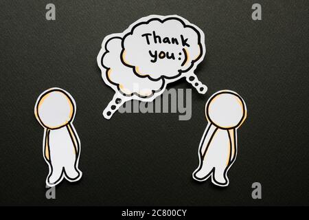Carta astratta figure umane con bolle di linguaggio Foto Stock