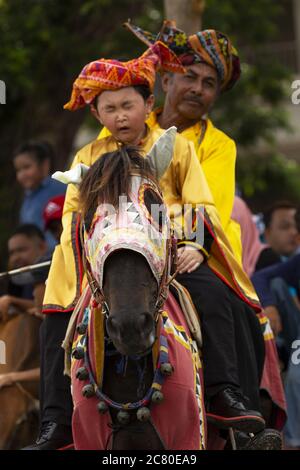 Tamu Besar festival Kota Belud Sabah Borneo Malesia tradizioni cowboy sud-est asiatico costume cavallo Foto Stock