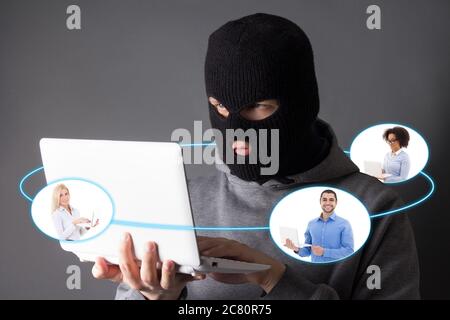 concetto di sicurezza internet - pirata informatico che sottrarza dati ad altri computer Foto Stock