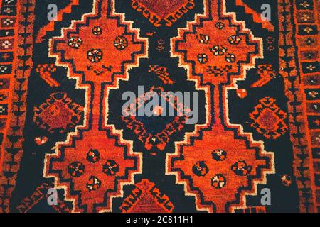 Primo piano della texture di un tappeto persiano Foto Stock