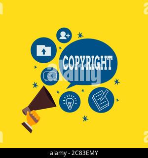 Scrittura concettuale a mano che mostra il copyright. Concetto che significa diritto legale esclusivo di stampa scrivere eseguire film record letterario mano di tenuta Megaphone Ta Foto Stock